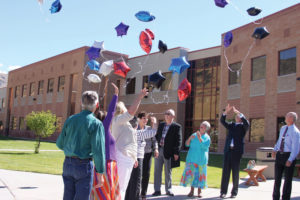 Pocatello Chubbuck School District 25 administrators release balloons at Century High School to commemorate the retirement of the bond for the construction of Century High School and renovation of Pocatello High School.